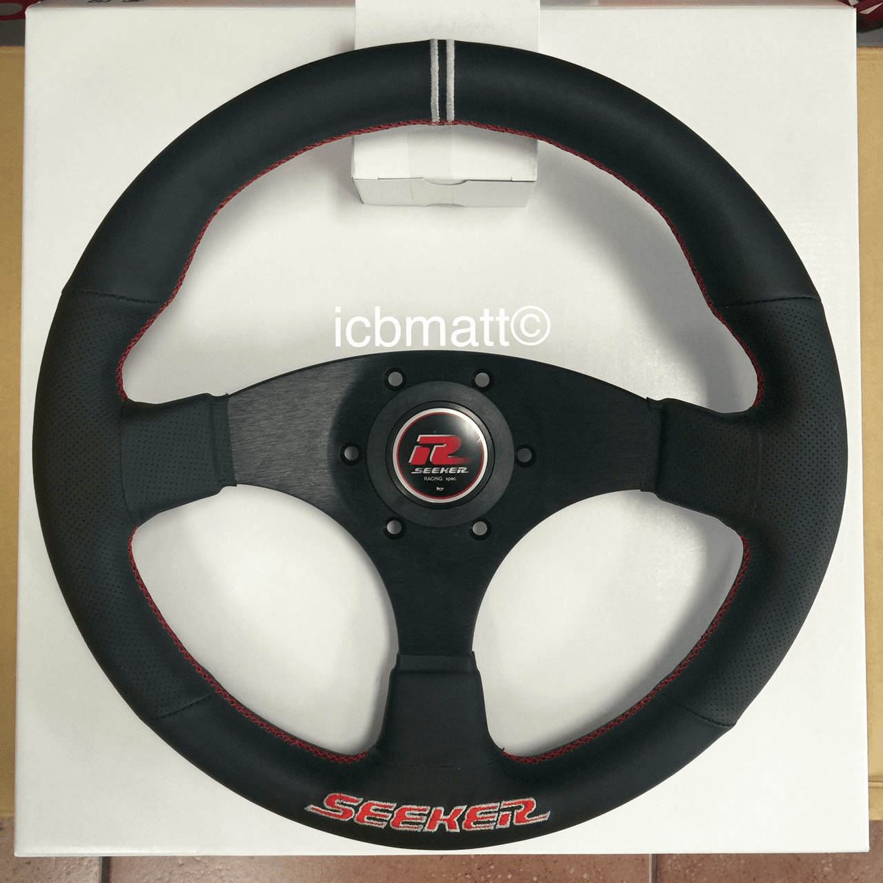 Seeker Steering Wheel Black Red Stitch 325mm Pre-Order