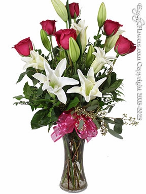 The Pink Rose Bouquet Featuring White Lilies