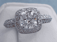 1.50 CTW CUSHION CUT DIAMOND ENGAGEMENT RING