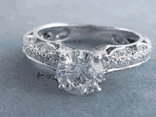 1.57 CTW ROUND CUT DIAMOND ENGAGEMENT RING F SI2