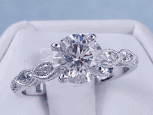 1.65 CTW ROUND CUT DIAMOND ENGAGEMENT RING H SI2