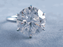 6.86 CARAT ROUND CUT DIAMOND RING H SI1