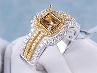 .74 CTW DIAMOND SEMI-SET TWO TONED ENGAGEMENT RING