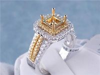 .76 CTW DIAMOND SEMI-SET TWO TONED ENGAGEMENT RING
