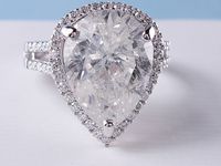 Pear Shape Rings With Accents Diamonds