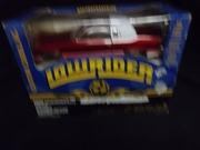 Revell 1560   Lowrider magazine  Custom Cadillac  Metal body    1/25   Box damaged-see pic.