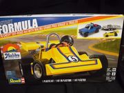 Revell 14581     --     '78 Chevy Off-Road 4x4 with Malibu Grand Prix Virage & Trailer    1:25