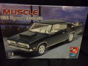 AMT 38275     --     1969 Plymouth Barracuda   1:25