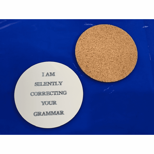 "Silently correcting your grammar" coaster