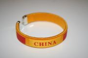 1 CHINA YELLOW COUNTRY FLAG FLEXIBLE METAL NYLON BRACELET .. NEW