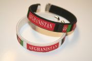2 AFGHANISTAN COUNTRY FLAG FLEXIBLE METAL NYLON BRACELETS ... 2 BLACK OR 2 WHITE OR ( 1 BLACK & 1 WHITE) ... NEW