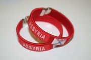 2 ASSYRIA RED COUNTRY FLAG FLEXIBLE BRACELETS WRISTBANDS .. NEW