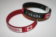 2 CANADA BLACK & RED COUNTRY FLAG FLEXIBLE METAL NYLON  BRACELETS .. NEW