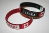2 CANADA BLACK & RED COUNTRY FLAG FLEXIBLE METAL NYLON  BRACELETS .. NEW