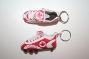 2 CANADA COUNTRY FLAG SOCCER SHOE CLEAT KEYCHAINS ... CANADIAN FIFA WORLD CUP .. NEW