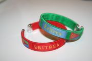 2 ERITREA COUNTRY FLAG FLEXIBLE METAL NYLON BRACELETS .. CHOOSE YOUR COLOR ... NEW