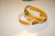 2 GUYANA COUNTRY FLAG FLEXIBLE METAL NYLON BRACELETS ... 1 WHITE & 1 YELLOW ... NEW