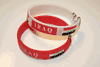 2 IRAQ COUNTRY FLAG FLEXIBLE METAL NYLON BRACELETS ... 2 WHITE OR 2 RED OR (1 WHITE & 1 RED) ... NEW