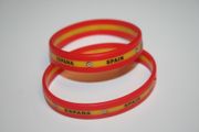 2 SPAIN ESPAND RED AND YELLOW LAYERED SILICONE BRACELETS WRISTBANDS ..NEW