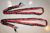 2 TRINIDAD & TOBAGO BLACK AND RED STRIPED COUNTRY FLAG LANYARDS KEYCHAINS PASSHOLDERS NECKSTRAPS ... FIFA WORLD CUP SOCCER FOOTBALL ...NEW