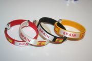4 SPAIN COUNTRY FLAG FLEXIBLE C BRACELETS WRISTBANDS ... FIFA WORLD CUP SOCCER FOOTBALL .. NEW