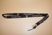 CADILLAC BLACK CAR AUTOMOBILE LANYARD KEYCHAIN PASSHOLDER ... NEW