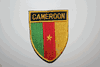 CAMEROON OVAL COUNTRY FLAG IRON ON SHIELD PATCH CREST BADGE .. NEW