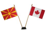 CANADA & MACEDONIA NEW SMALL 4" X 6" INCHES MINI DOUBLE COUNTRY STICK FLAG BANNER WITH BLACK STAND ON A 10" INCH PLASTIC POLE .. NEW