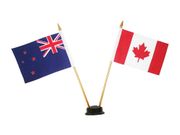 CANADA & NEW ZEALAND SMALL 4" X 6" INCHES MINI DOUBLE COUNTRY STICK FLAG BANNER WITH BLACK STAND ON A 10" INCH PLASTIC POLE .. NEW