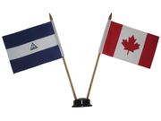 CANADA & NICARAGUA SMALL 4" X 6" INCHES MINI DOUBLE COUNTRY STICK FLAG BANNER WITH BLACK STAND ON A 10" INCH PLASTIC POLE .. NEW