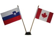 CANADA & SLOVENIA SMALL 4" X 6" INCHES MINI DOUBLE COUNTRY STICK FLAG BANNER WITH BLACK STAND ON A 10" INCH PLASTIC POLE .. NEW