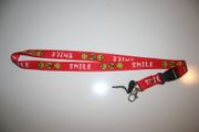 HAPPY SMILEY FACE RED LANYARD KEYCHAIN PASSHOLDER ..  NEW