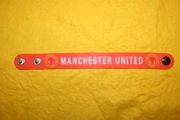 MANCHESTER UNITED FC  FOOTBALL CLUB ORANGE SOCCER WRIST BAND BRACELET....NEW