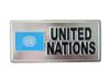 UNITED NATIONS SMALL SILVER METAL LICENSE PLATE STICKER DECAL EMBLEM FLAG .. NEW