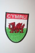 WALES CYMRU COUNTRY FLAG OVAL IRON-ON PATCH CREST BADGE