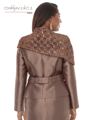 Donna Vinci Couture <br> (Fall/Holiday 2026) <br> DV12288 <br> <br> ALMOND <br> 8 10 12 14 16 18 20<br> <br> 2pc. Jacket & Skirt Set <br> Virtual Silk Look Fabric Designed With Novelty Fabric Trimmed in Velvet & Sequin. Belt Included.