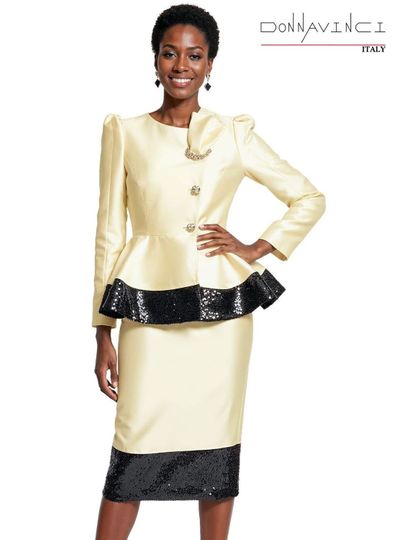 Donna Vinci Couture <br> (Spring/Summer 2026) <br> DV12252-CA <br> <br> CANARY/BLK <br> 8 10 12 14 16 18 20<br> <br> 2pc. Jacket & Skirt Set <br> Virtual Silk Look Fabric, Trimmed With Black Sequin Novelty Fabric & Updated Buttons