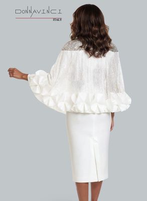 Donna Vinci Couture <br> (Spring/Summer 2026) <br> DV12268 <br> <br> WHITE <br> 8 10 12 14 16 18 20 22 24<br> <br> 2pc. Jacket & Skirt Set <br> Virtual Silk Look Fabric Designed With Exclusive Lace Cape, Trimmed With Silver Sequins & Beautiful Buttons