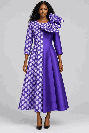 Giovanna <br> (2026) <br> GVD1717-Pu <br> <br> Purple <br> 8 10 12 14 16 18<br>16w 18w 20w 22w 24w 26w<br><br>Statement Shoulder Bow A-Line Midi Dress