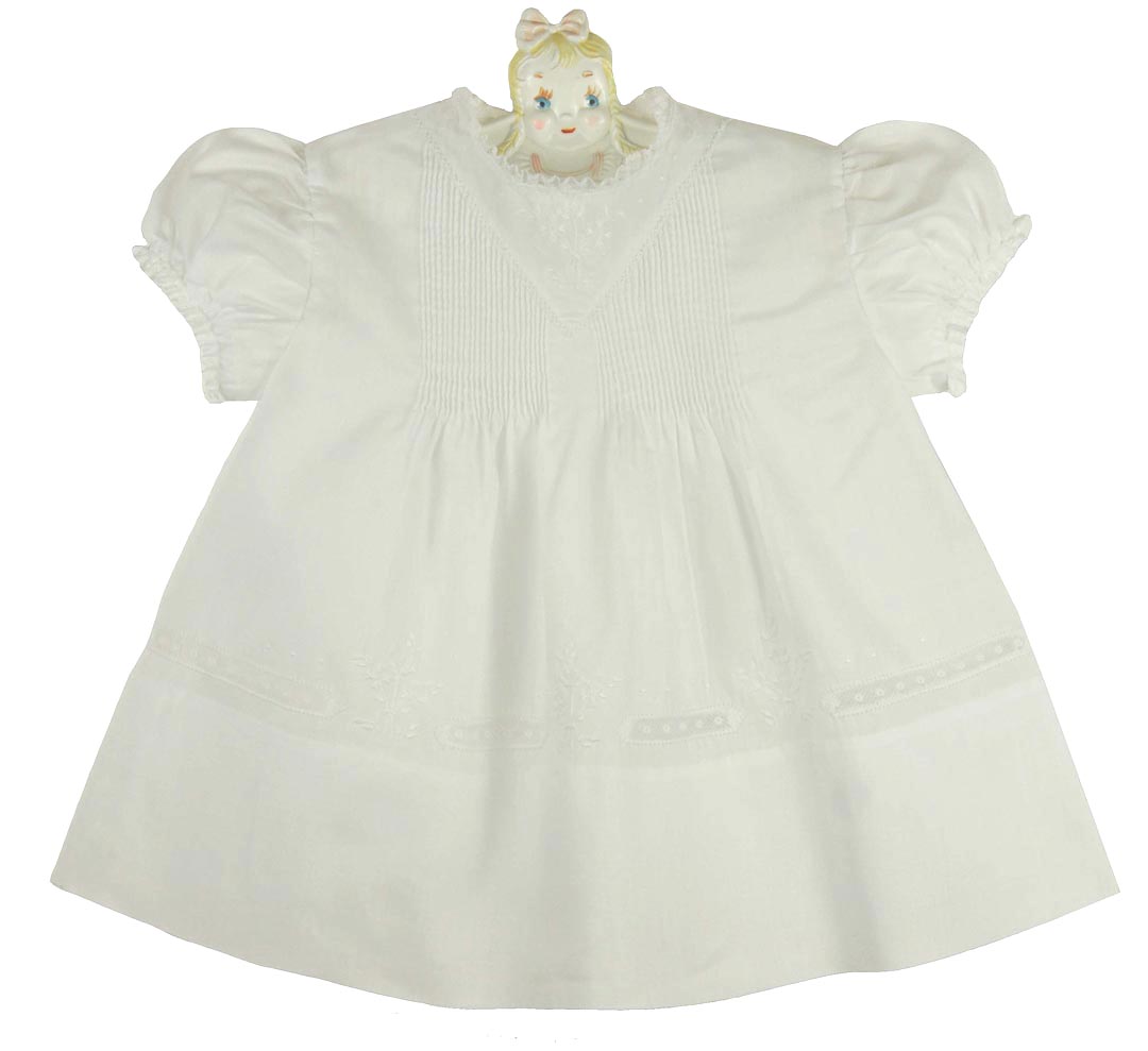 hand embroidered white baby dress with pintucks and lace insertion