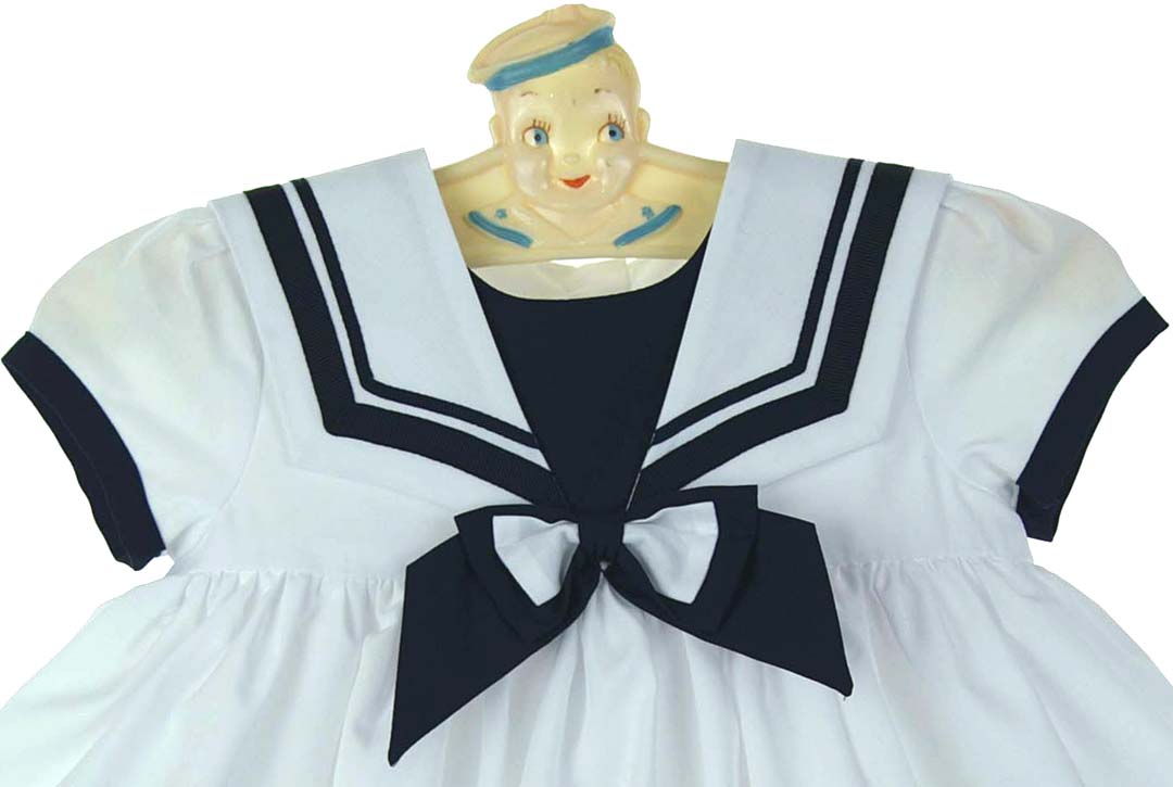 Sarah Louise white sailor dress with navy trim,.white and navy sailor