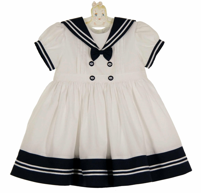 white dress navy 1984 CPO Full Women's Uniform Short sleeves Stand up tunic collar Length hits above knee Pull on styling Ric White Summer Dress + Red