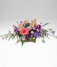 A table centerpiece of colorful flowers