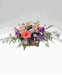 A table centerpiece of colorful flowers