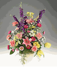 A vase arrangement filled with spring flowers.