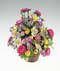 Basket of mixed bright flowers.