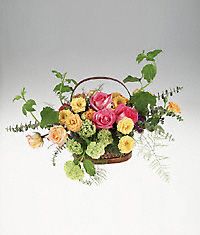 Mixed colorful roses in a basket.