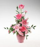 Pink flower arrangement in a vase.