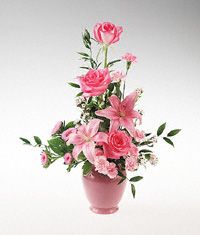Pink flower arrangement in a vase.