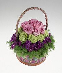  Rose and  flowers in a basket.